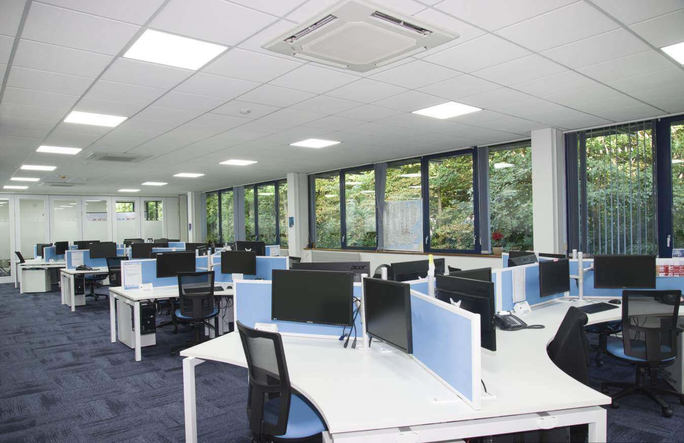 Open-plan office cooled by a ceiling cassette unit
